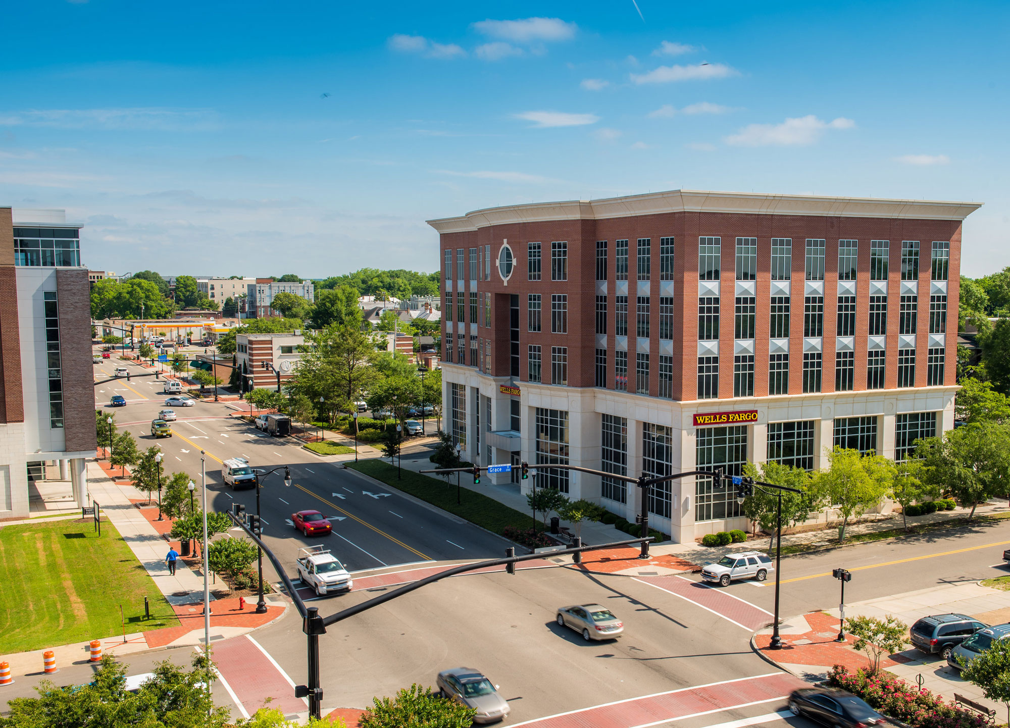 Commercial office renovation in progress with workers performing interior build-out